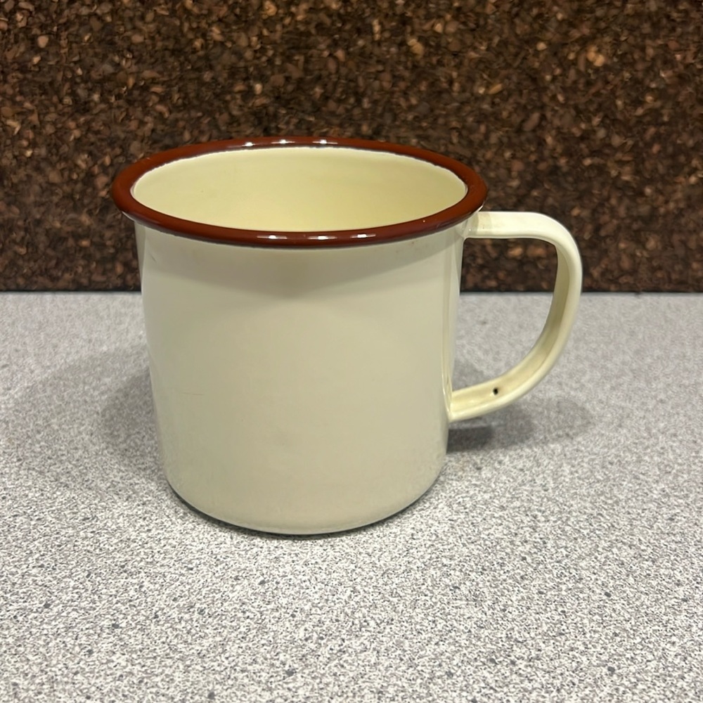 Vintage enamel cup. No chips or cracks